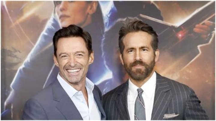 
Hugh Jackman Jokingly Begs Academy Not to Nominate Ryan Reynolds’ ‘Spirited’ Song for Oscar 