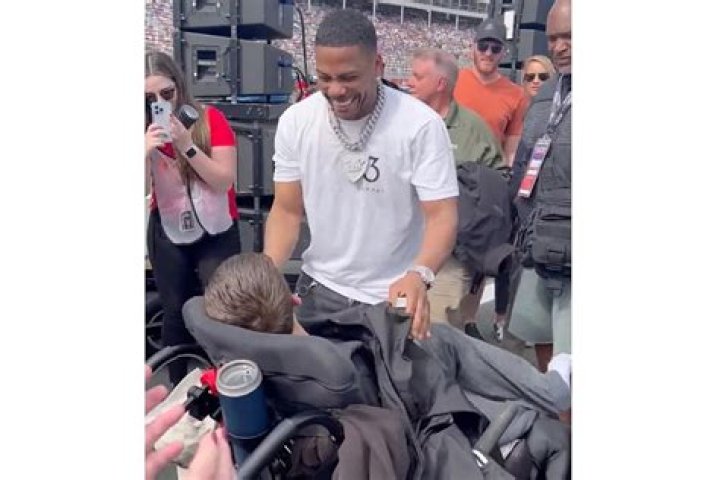 
Watch Nelly Give His Jacket to Fan with Disabilities at Bank of America Roval 400 NASCAR Race in Sweet Video 